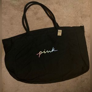 🎒NWT Black 16x12 zippered bag with Pink logo.